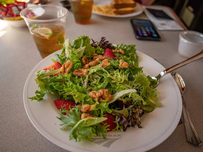 My first Amtrak meal was a mixed-green salad topped with strawberries, walnuts, and raspberry vinaigrette.