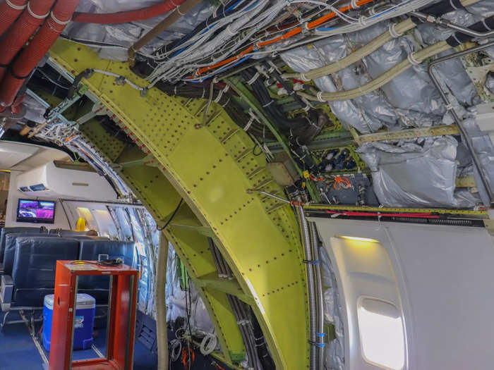 To create the testbed, the plane spent three years being stripped of its interior — losing about 15,000 pounds of weight — and modified with special technologies and systems.