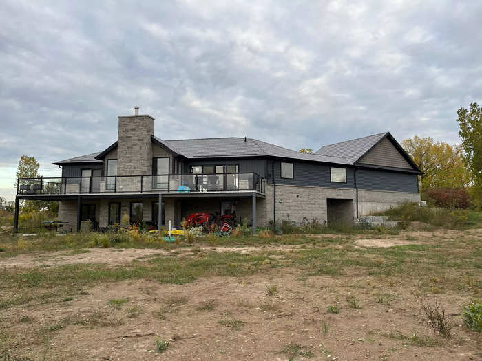 The family has a large balcony facing the backyard.