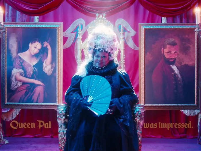 Pat McGrath makes a brief cameo as the queen, flanked by portraits of Zoë Kravitz and  Sam Dew.