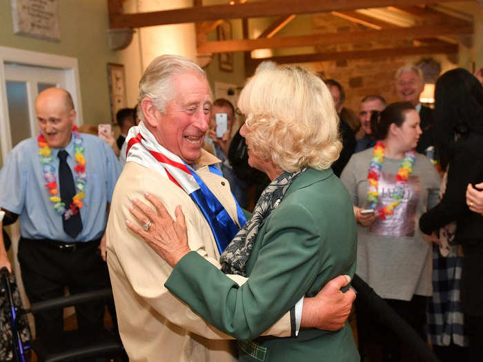 Rooke particularly enjoys photographing Charles and Camilla together, like this image of them dancing he took in Scotland in 2017.