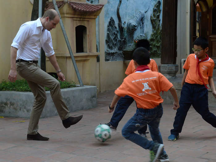 He enjoys playing sports with them.