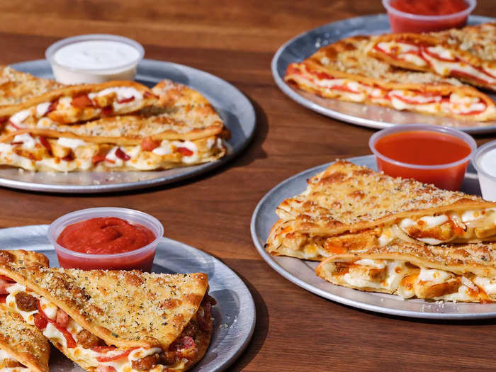 There are four varieties of Melts, two of which are inspired by pizza flavors and two of which take after sandwich options. Each order is $6.99 and comes with two pieces and a side of sauce for dipping.