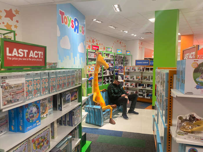 As children ran around the store enthusiastically, some parents took a moment to relax.