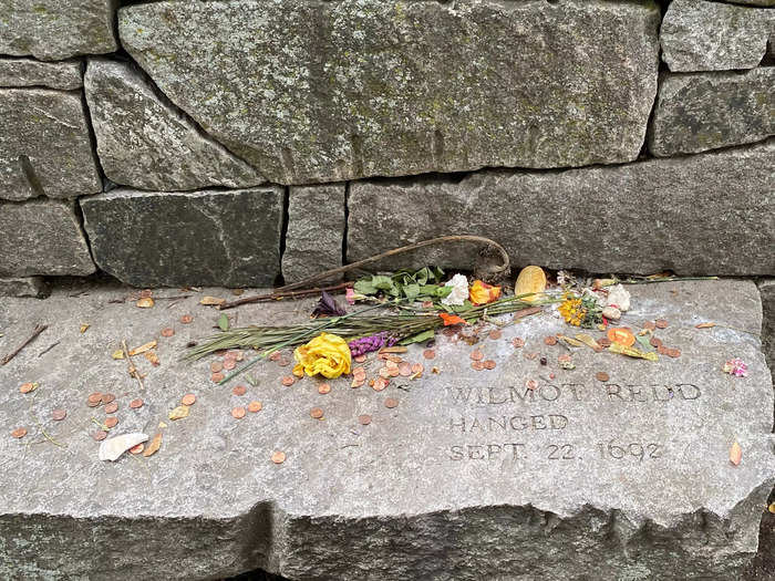 The Salem Witch Trials Memorial honored victims who died more than 300 years ago, but visitors still placed tokens like flowers and coins at the site.