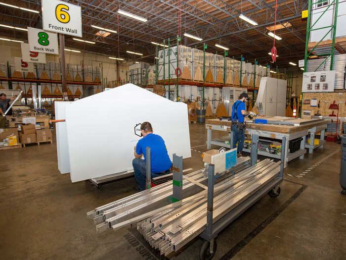 The Washington-based company currently prefabricates a 64-square-foot and 100-square-foot tiny home, bathroom, and office in its large factory space in Everett, Washington.