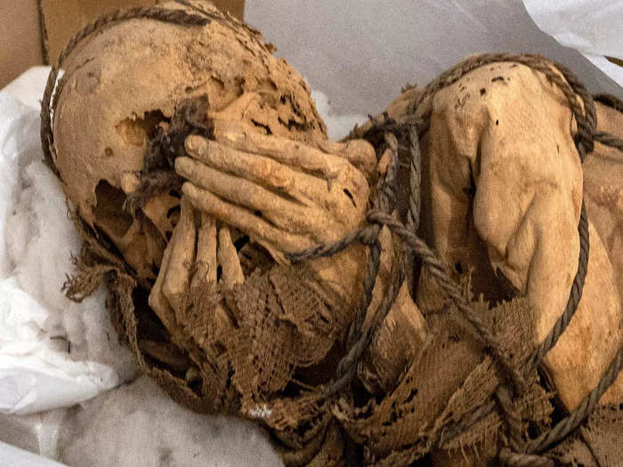 A pre-Inca dignitary was found mummified, bound, and clasping his hands to his face.