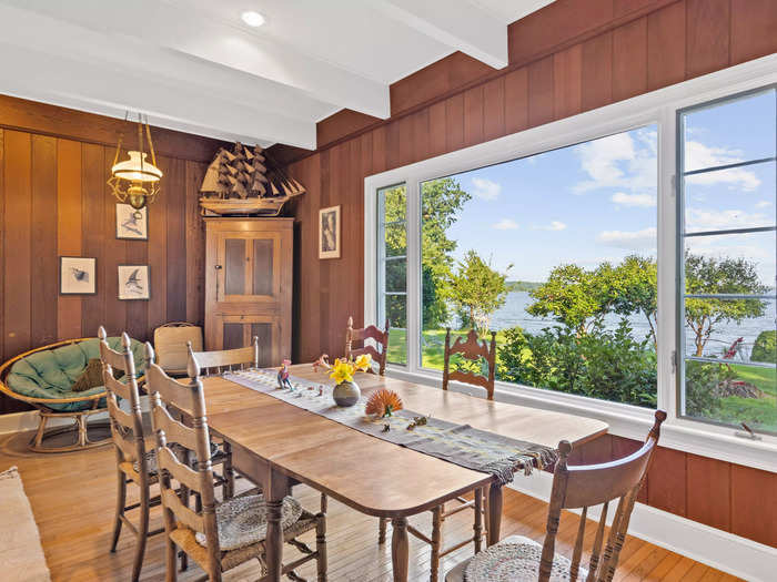 Large windows in the great room offer sweeping views of the surrounding waters.