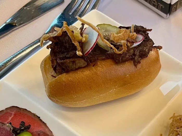 Moving on to entrees, Qatar offered small portions of six of its current non-FIFA-specific dishes, including a pulled beef hotdog …