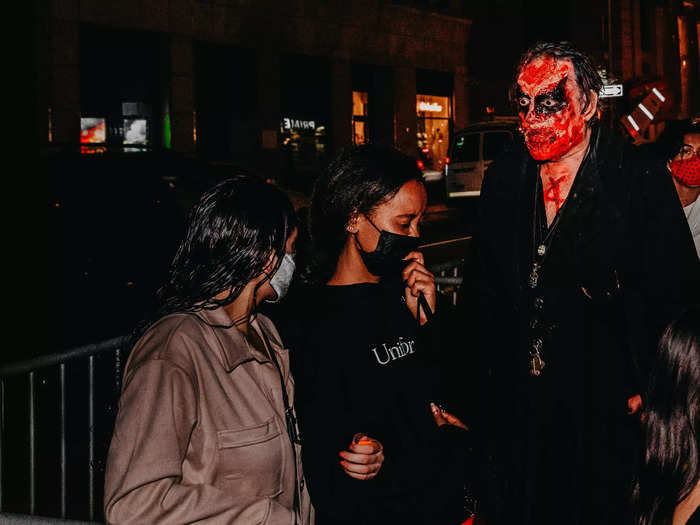 The frights started while we stood in line, as blood-soaked characters came out for photos and jump scares.