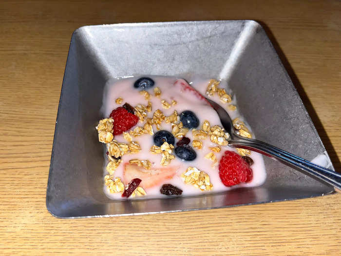 Next our server brought a strawberry-yogurt parfait with berry granola for the table.