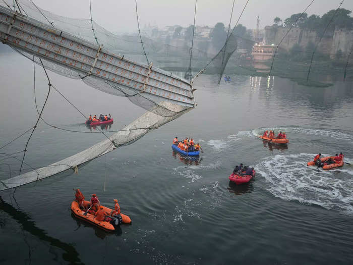 At least 141 people were killed Sunday after a pedestrian bridge collapsed over the Machchhu River in the western Indian state of Gujarat.