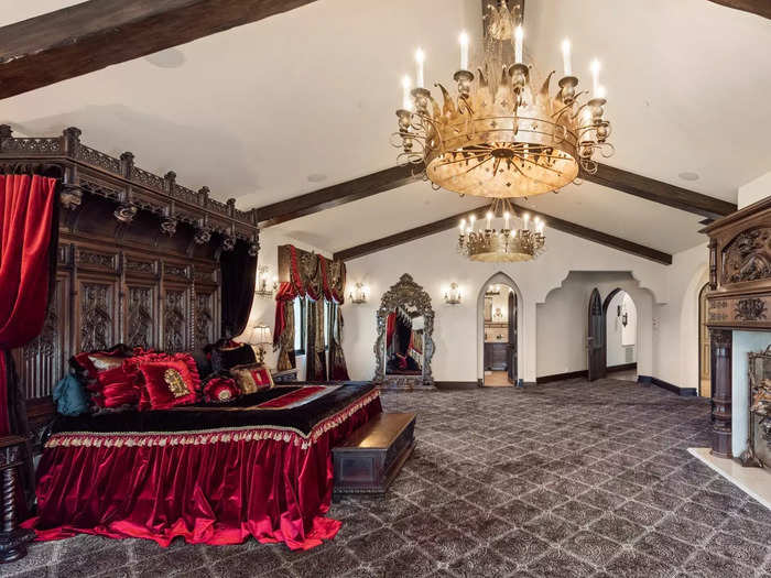 The nearly 2,000-square-foot bedroom features a massive 250-year-old wooden headboard sourced from an Austrian castle, Rivani said.