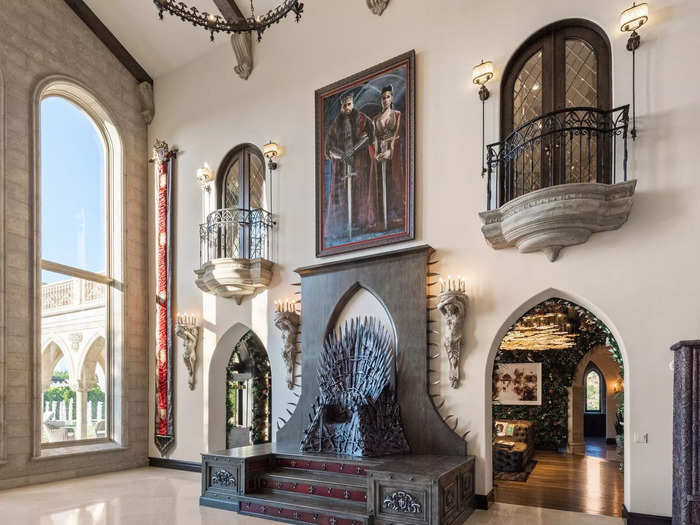 The throne is the centerpiece of their Great Hall, which has 35-foot ceilings and a life-sized portrait of the Rivanis dressed in Medieval outfits and brandishing swords.