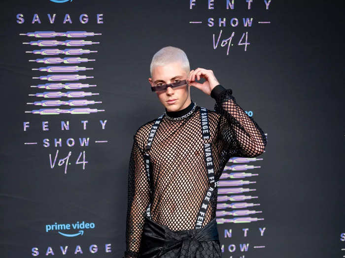 Jacobi Jacobs also rocked a sheer look, pairing a long-sleeve fishnet top with silk pants and Savage X Fenty suspenders.
