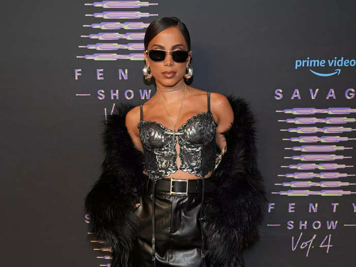 Anitta paired a metallic corset top with leather pants and a fuzzy wrap, and her sunglasses and slicked-back hair gave the look a glamorous feel.