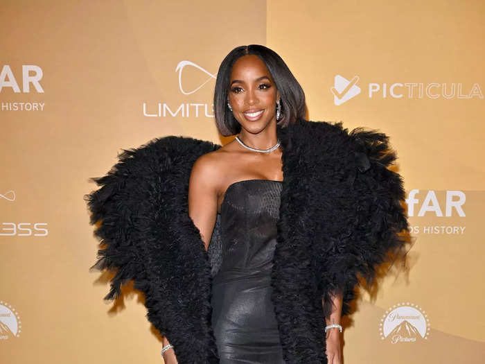 Kelly Rowland brought the glamour in a black gown and matching shawl.