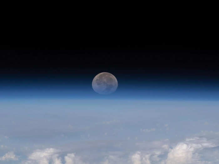 Astronauts also get to see the moon rising and setting above the curvature of the Earth.