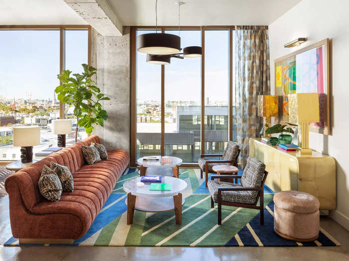 From orange velvet couches to patterned rugs, the space was abundantly colorful without feeling overwhelming.