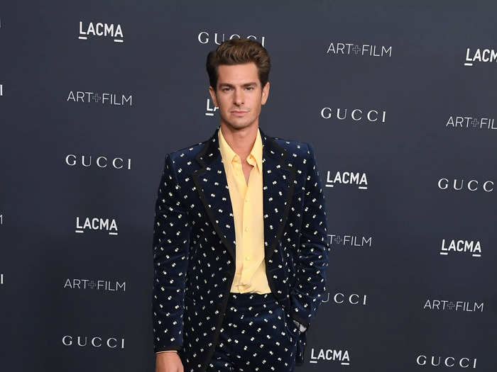 Andrew Garfield looked as dapper as ever in a plush indigo-blue Gucci suit.