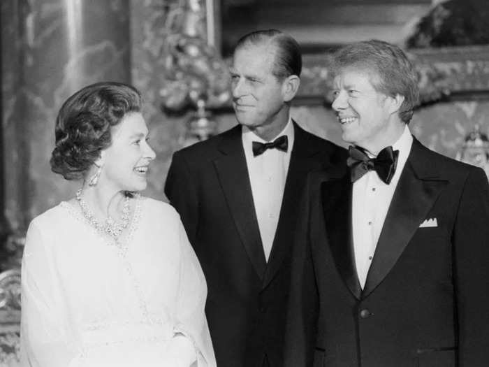 President Jimmy Carter chatted with the Queen and Prince Phillip in the Blue Room of Buckingham Palace in 1977.