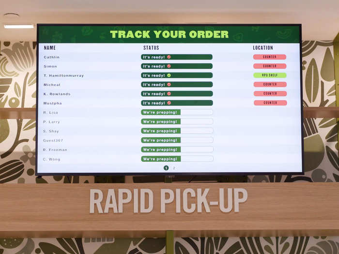 A digital order status board shows customers how their food is coming along before they pick it up.