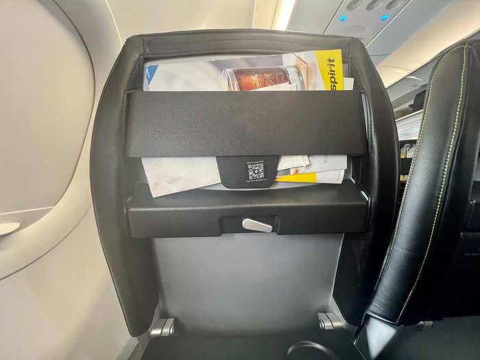 In addition to the hard seat, Spirit also offers travelers a tiny tray table, but that