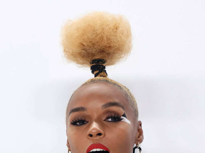 Janelle Monáe played with a towering bun and geometric eyeliner that matched her outfit.