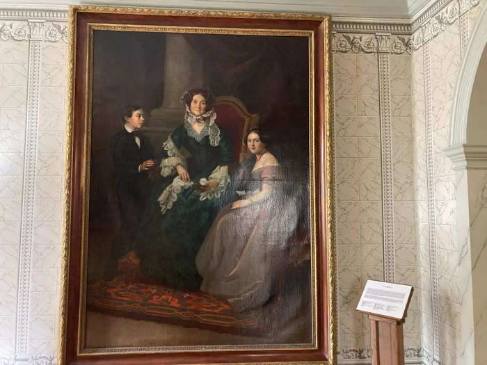 Further into the first floor hall, a floor-to-ceiling portrait depicted Eliza Jumel and her grandchildren.