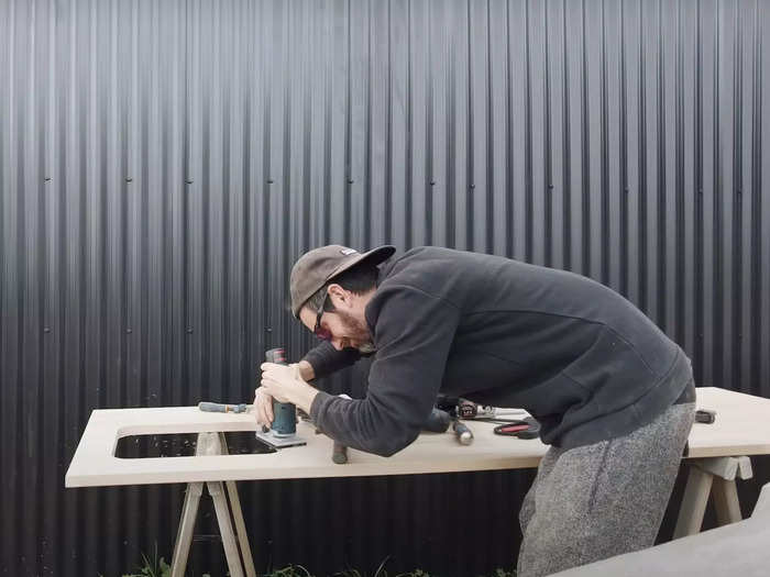 The couple started building the tiny cabin in December 2020 and lived out of their van in the early days of the build.