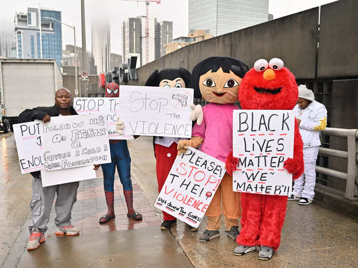 A few spectators outside took the day as an opportunity to protest gun violence.