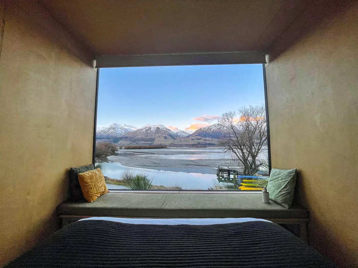 At the front of the window was a cushioned bench — another option for viewing the expansive lake and mountain range.