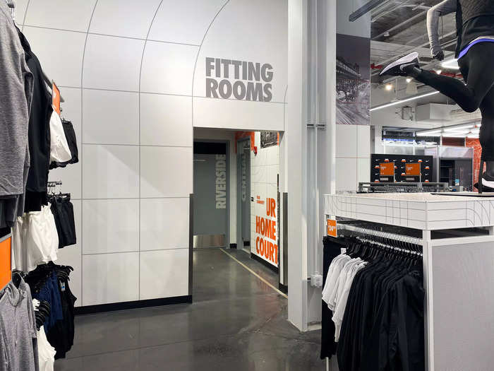 The store had three fitting rooms available for shoppers to use to try on clothing.