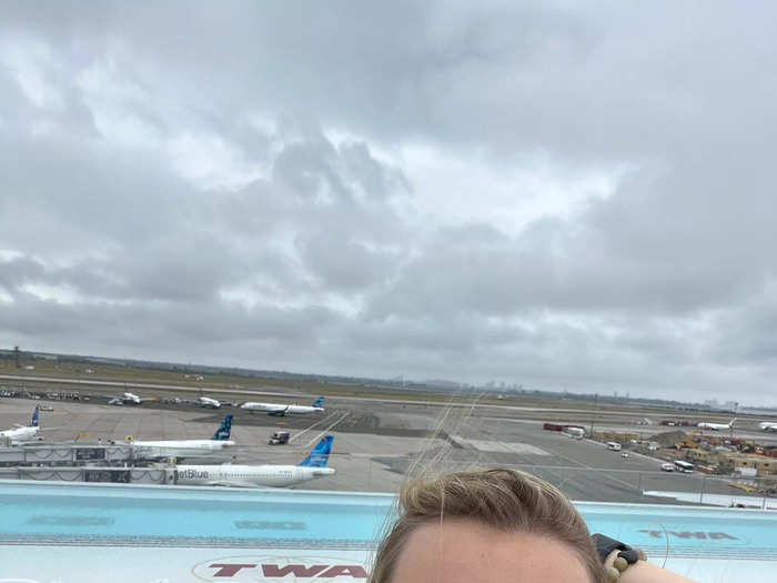 The enormous rooftop infinity pool looked directly out at the airport