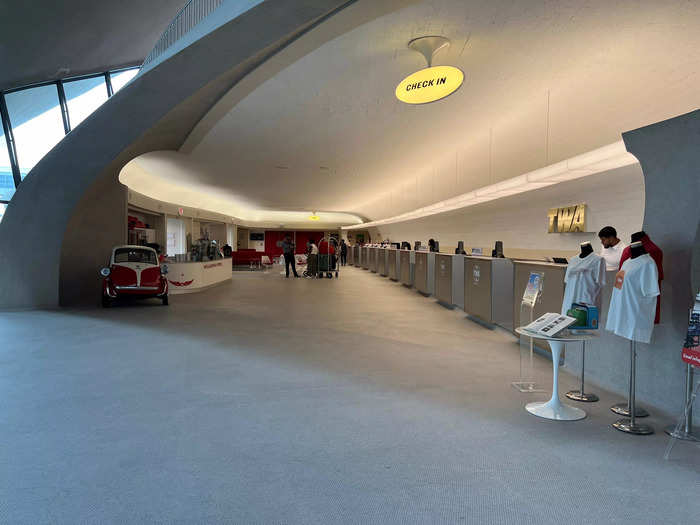 The check-in desks looked like the airline counters where travelers check their luggage.