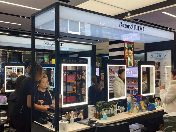 In the middle of the store is the beauty studio, where professional makeup artists were giving Sephora customers makeovers.