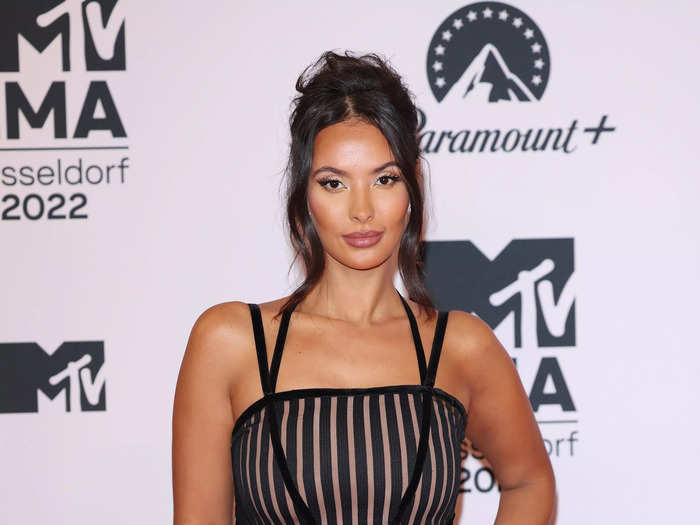 The new host of "Love Island" UK, Maya Jama made an appearance in a striped black sheer gown.