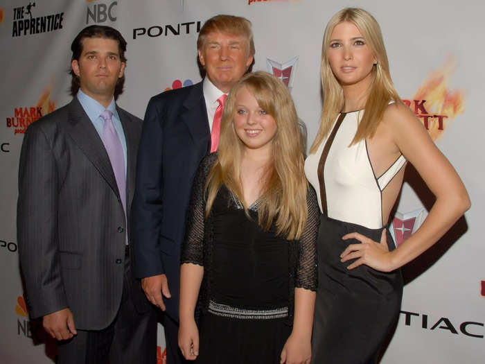 A 12-year-old Tiffany posed alongside Don Jr., Ivanka, and Donald at "The Apprentice" season 5 finale party in June 2006.