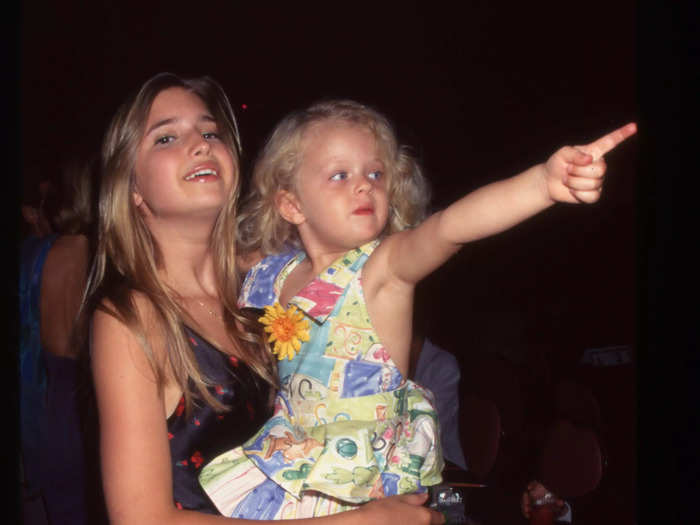 Ivanka held a young Tiffany while attending an unspecified event in January 1995.