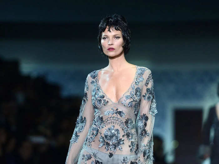 Moss brought mesh back to the runway in 2013 via a blue Louis Vuitton gown. It had long sleeves, a V neckline, and floral embroidery across its see-through fabric.