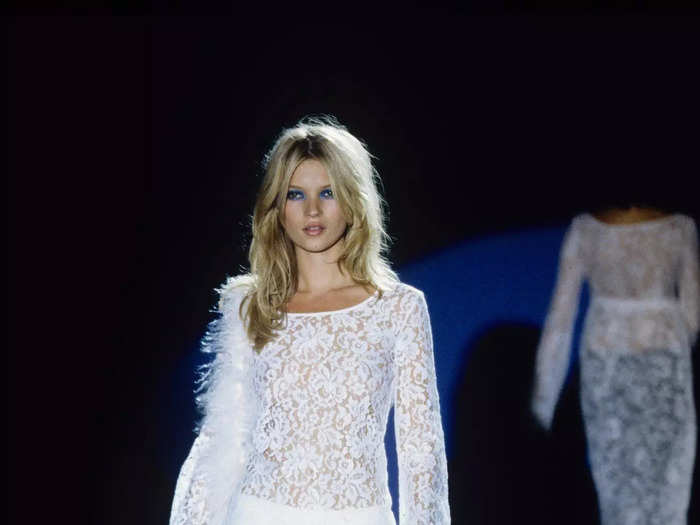 On a Gucci runway in 1995, Moss strutted the catwalk in a lace minidress that was see-through across its bodice and sleeves.