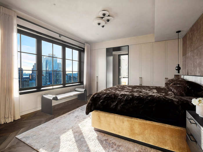 On the lower floor are the three full-bedroom suites with connecting bathrooms and closet space. The principal suite has a private foyer, a hand rubbed Cortina leather wall, and custom built-ins with automatic lighting.