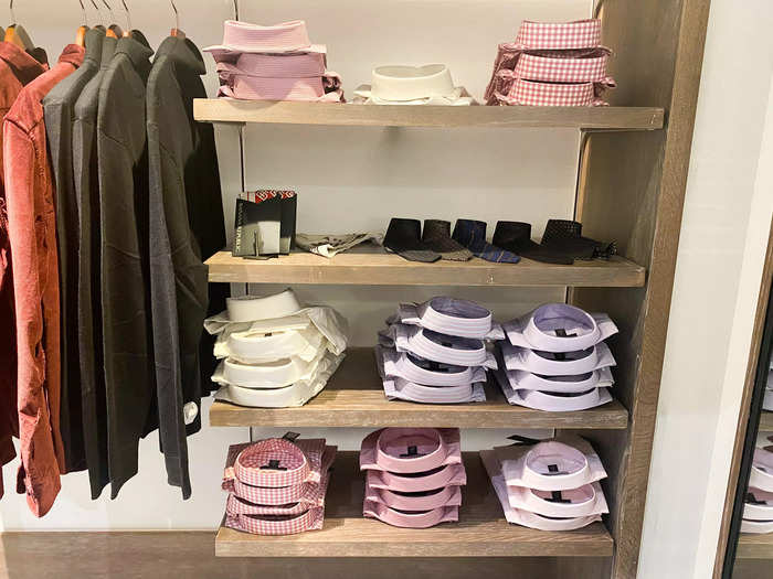 There were collared dress shirts folded on shelves around the store. The shirts, priced between $60 and $120, were slightly cheaper than the ones available at J.Crew.