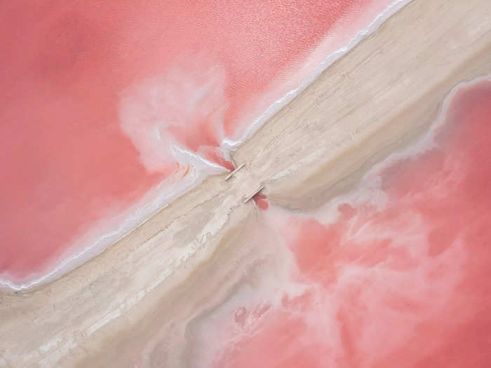 A more colorful sign of human presence is these pink lagoons near a salt mine.