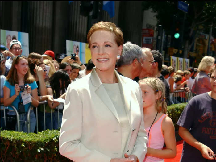 Julie Andrews mirrored the queen she played on screen with her monochrome ensemble.