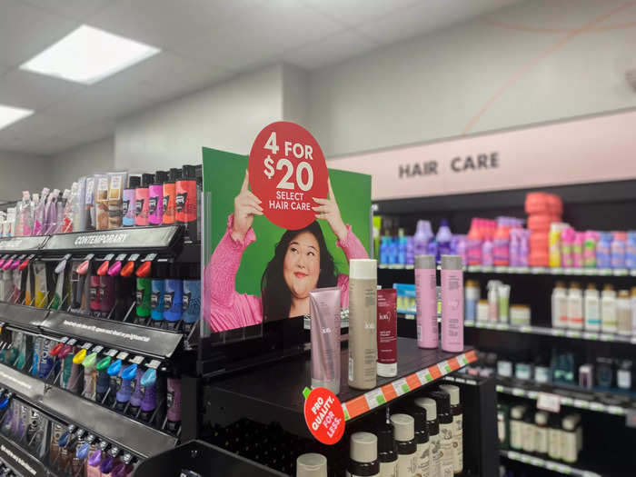 Signs offering discounts on hair care products were fixed to displays and shelves. Seeing all the signs made me wonder if the store always had big deals going on or if it was a sign of the company