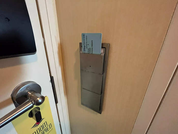 To turn the lights on in our room, we had to put a room key card in the slot next to the door.