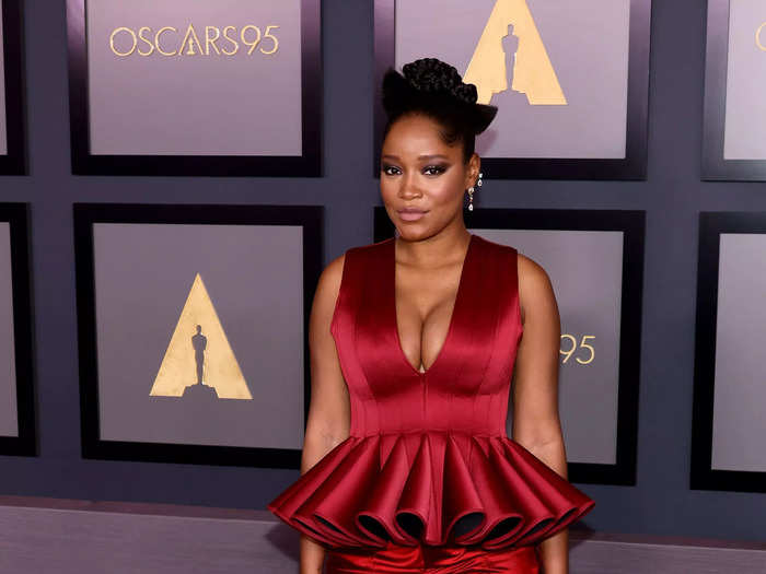 Keke Palmer went for a bold look in a red peplum dress.