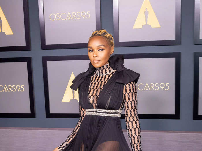 Janelle Monáe showed off her legs with a sheer, black dress with a statement neckline.