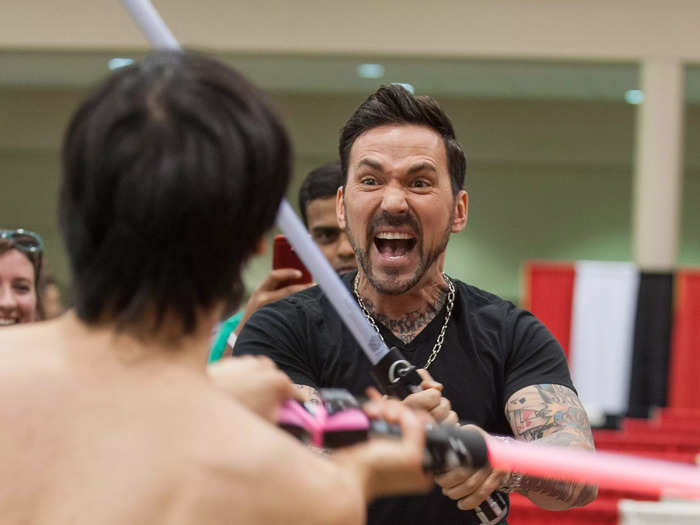 Frank spent time play-fighting with attendees at Fan Expo Canada in 2018.